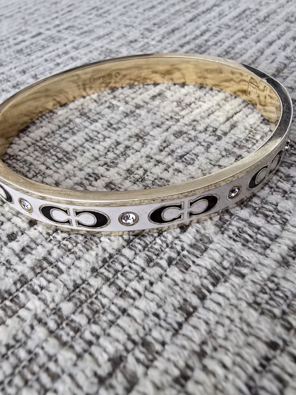 Coach Gold-Tone Bangle with Black Enamel and Crystals